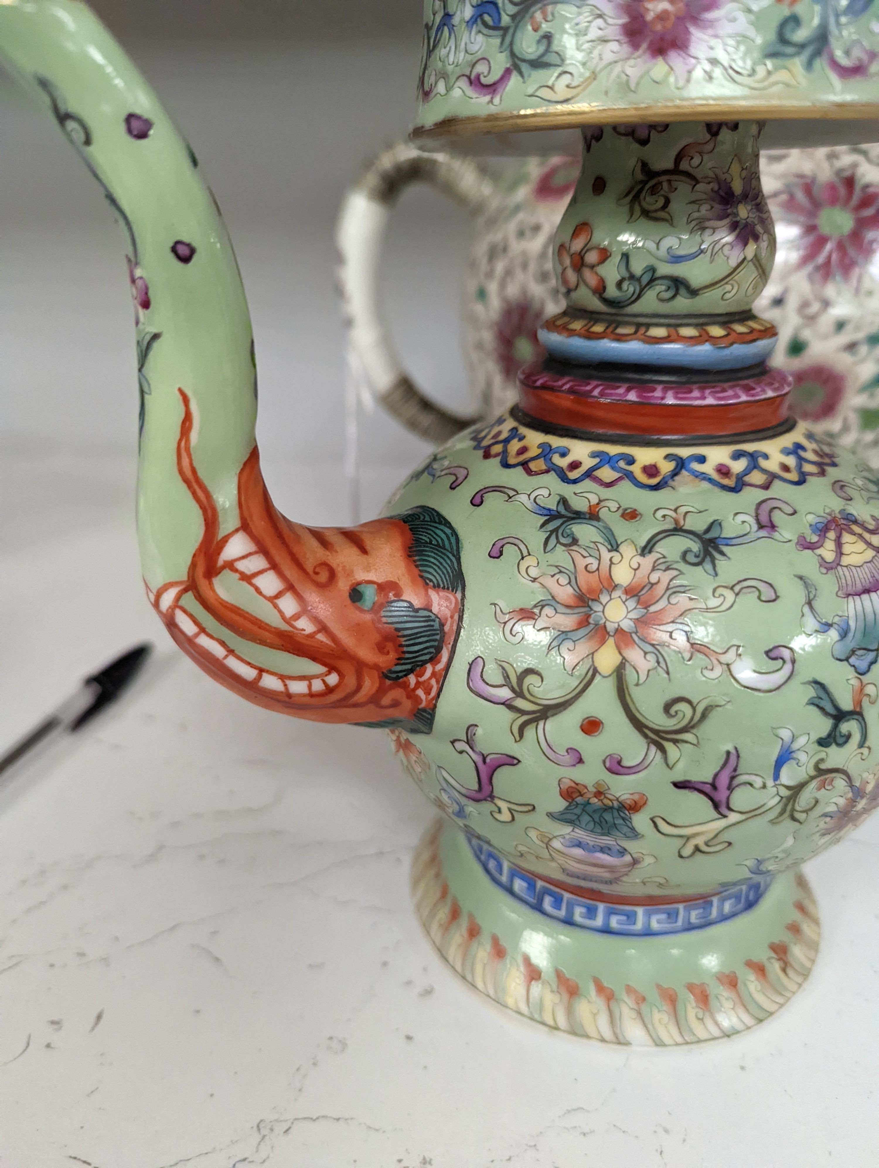 A large 19th century Chinese famille rose wine pot, and another wine pot, tallest 27cm